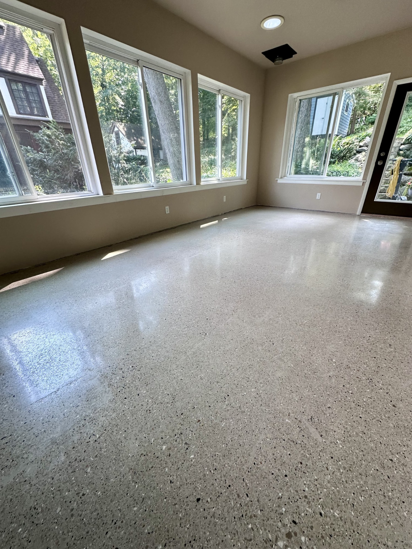 Bright polished concrete floor in a finished residential space